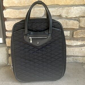 Knomo Scala Laptop bag! If Louboutins were a carry on bag this would be it!